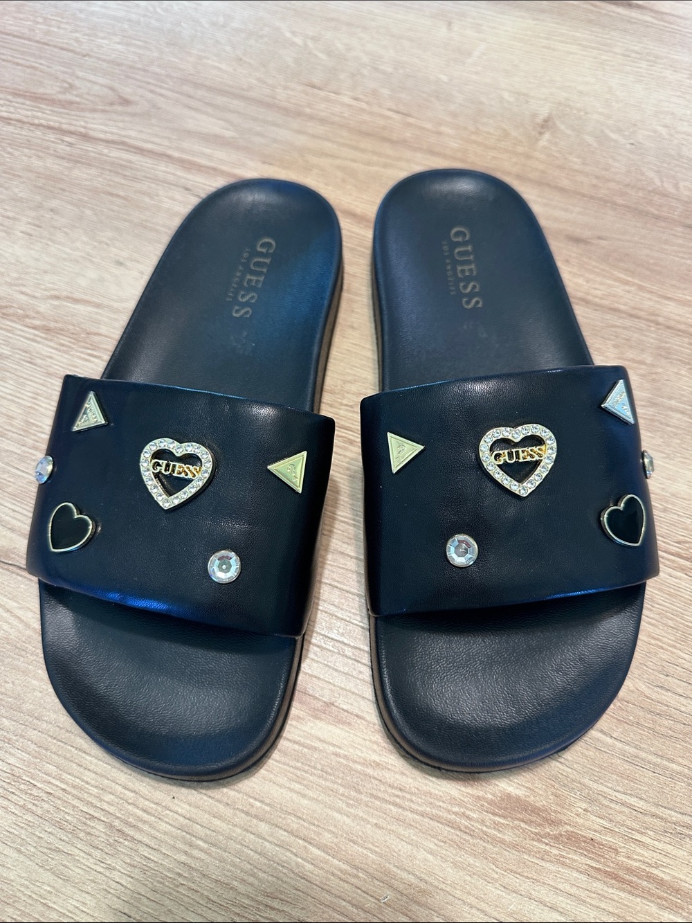 Guess Black Slide Sandals with Gold Heart & Crystal Accents